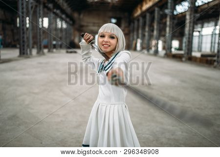 Anime style blonde girl with swords, cute lolita