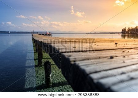 An image of a nice wooden jetty at Starnberg lake