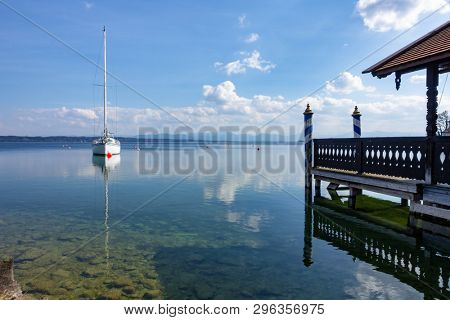 An image of a nice wooden boat house at Starnberg lake