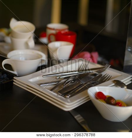 Mess In A Litchen After A Meal Finished With A Pile Of Unwashed Dishware