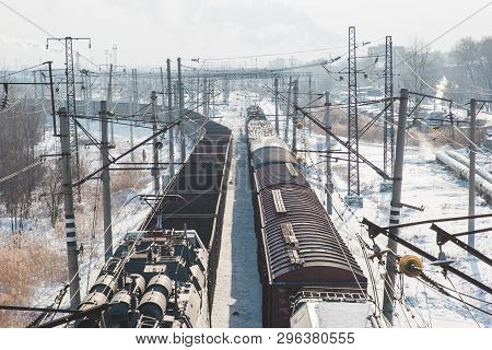 Rail Cars Loaded With Coal Being Transported From Nearby Mines To Power Plants In Winter
