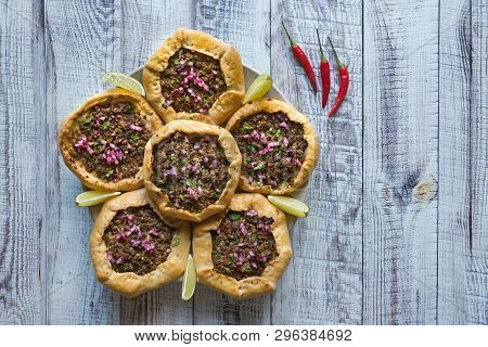 Beef Mince Sfiha - Arabian Opened Meat Pies On White Wood Background.