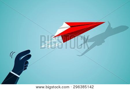 Hand Human Who Threw The Red Paper Plane There Is A Shadow On The Wall As An Airplane. Isolated On B