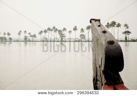 A House Boat Sails Through The Vembanad Lake In Kumarakom, Kerala