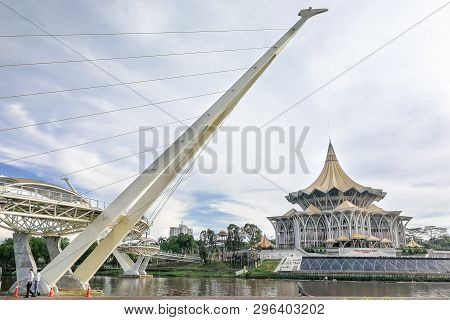 Kuching, Malaysia, April 18, 2019: The Darul Hana Bridge Across Sarawak River Overseeing The Sarawak