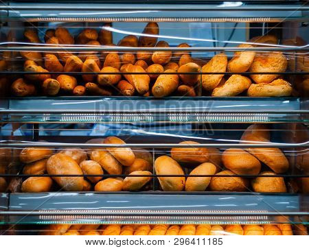Background - Shelves In A Grocery Store With Fresh Bread Of Different Varieties