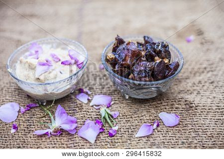 Close Up Shot Of Popular Indian & Asian Khajor Dudh Or Dates Milk In A Transparent Glass Bowl Along