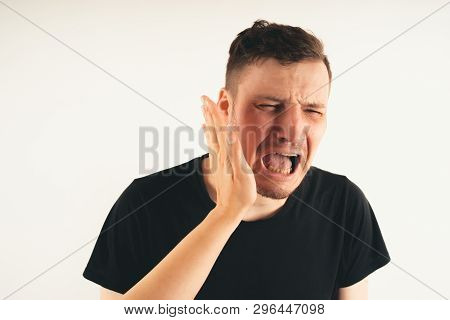 Crop Person Slapping Scared Man In Face
Emotional Male Getting Slapped In Face While Shouting With C