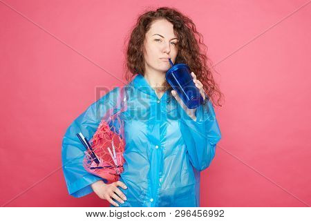 Plastic Outfit Is Not In Trend Anymore! Confident Female, Holds Bag With Indecomposable Products, Dr