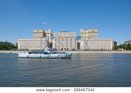 Pleasure Boat Floats Past The Building Of The Ministry Of Defense Of The Russian Federation On The F