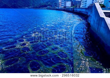 The View Of The Waterfront Of City Beppu Summer Evening. Toned