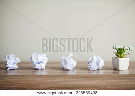 Great Idea Concept. Crumpled Colorful Paper On Wooden Table