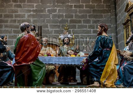 Avila, Spain - April 17, 2019. The Last Supper,  religious images of the Holy Week footsteps inside the Cathedral of Ãvila, Spain