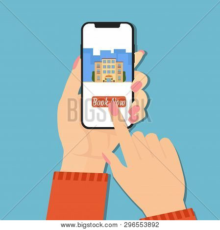 Design Concept Of Hotel Booking Online. Hand Holding Phone With Book Now Button And Hotel On Screen.