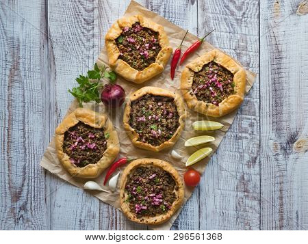 Beef Mince Sfiha - Arabian Opened Meat Pies On White Wood Background.