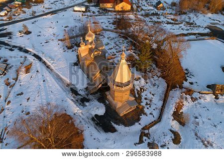 Aerial View Of The Ancient Wooden Church Of Dmitry The Theunal Myrrh-stream In April Evening (aerial
