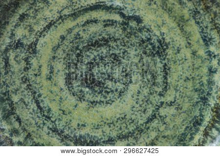 Background Of Old Pottery With Molds Of Mint
