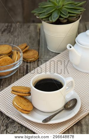 Cup Of Coffee With Sweet Cookies, Ginger Bread. Abstract Breakfast Image. Rustick Wooden Background.