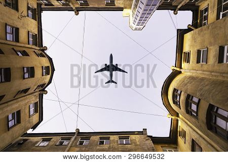 House Well. The Aircraft, The Plane Flies Over The House. Old Town House. Bottom View.