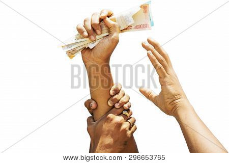 Concept Showing Of Greed For Money, Hands Trying To Grab Money From Another Perosn Hands.