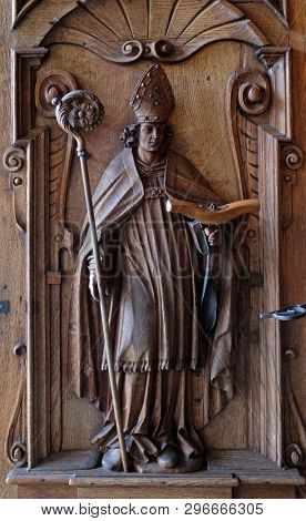 LUCERNE, SWITZERLAND - JUNE 24, 2018: Saint Leodegar, door of the church of St. Leodegar in Lucerne, Switzerland