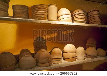 Pots And Pottery On Shelf Displayed At Qumran Site, Israel