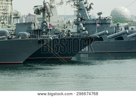 The Bow Of The Warships In The Bay Anchored Astern To The Pier