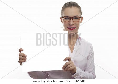 Young Woman In White Blouse Long Hair In Tail In Eyeglasses Smiling Holding A Blank Board Banner On 