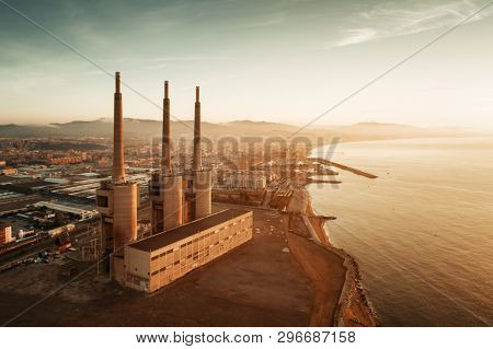 Besos thermic power plant aerial view at sunrise in Barcelona coast Spain.