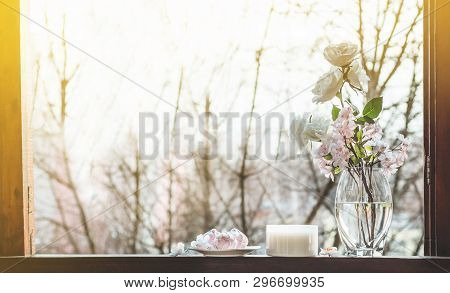 Cozy Spring Still Life: Cup Of Hot Tea With Spring Bouquet Of Flowers On Vintage Windowsill With A P