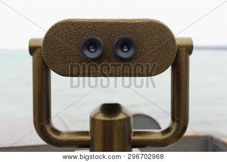 Public Binocular Telescope On The Observation Deck Overlooking The Sea. Binoscope Closeup, Stationar