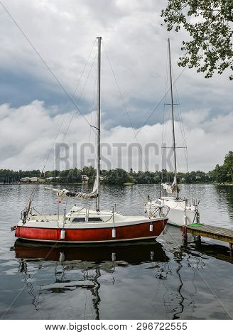 Trakai, Lithuania - August 15, 2017:little Yellow Sport Yacht On The Lake Trakai, Lithuania. Beautif