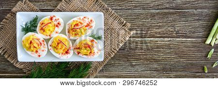 Deviled Eggs. Delicious Appetizer. Boiled Eggs Stuffed With Yolk, Mustard, Mayonnaise, Paprika. Clas