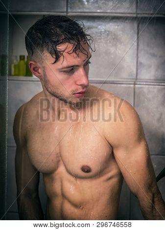 Naked Athletic Handsome Young Man Taking Shower