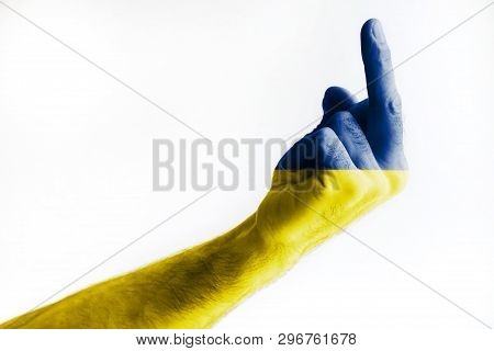 A Mature Male's Hand Painted In The Colors Of The Ukrainian Flag Shows A Sign. Isolated On White