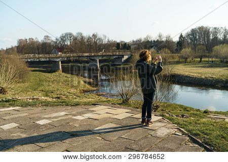 River With A Bridge In The Backround In Sabile, Latvia