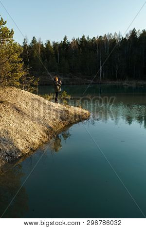 Young Woman Takes Travel Photos -beautiful Turquoise Lake In Latvia - Meditirenian Style Colors In B