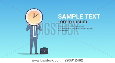 Businessman Holding Clock In Front Of Face Effective Time Management Deadline Business Efficiency Co