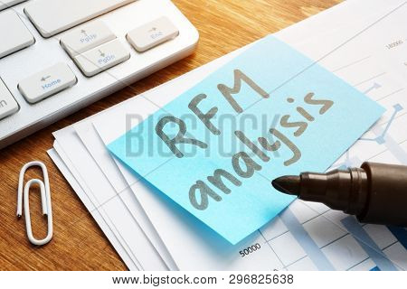 Rfm Analysis Handwritten On A Piece Of Paper And Report.