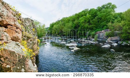 Panoramic View Of The River Section With Rocky Shore