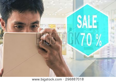 Man Holding Tablet For Blurred Bokeh Background E-shopping Marketing Digital, Consumer Purchase Shop