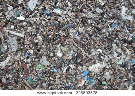 Micro Plastics Marine Debris On The Sand Beach.