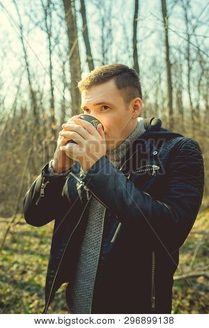 Man Drinking Coffee In Cold Woods
Casual Man In Outwear Enjoying Hot Drink In Paper Cup Standing In 