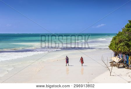 Diani Beach, Kenya - October 16, 2018: Unindentified African Men Wearing Traditional Masai Clothes O