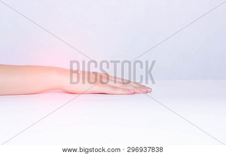 Pain And Inflammation In The Wrist Of A Girl, White Background, Close-up, Copy Space, Carpal Tunnel 