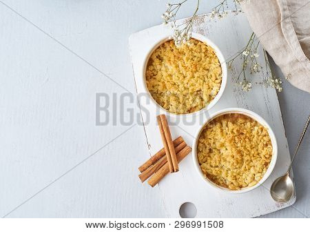 Apple Crumble With Streusel, Copy Space, Top View, Light Gray Table. Morning Breakfast.