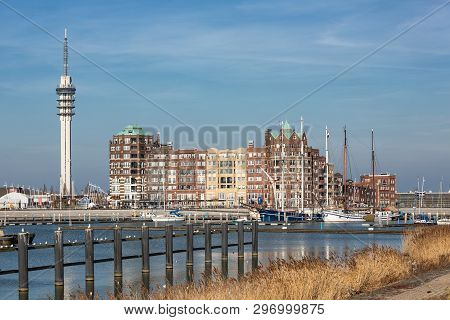 Lelystad, The Netherlands - February 23, 2019: Harbor With Communication Tower And Modern Apartment 