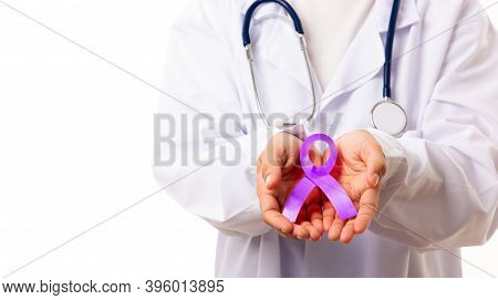 National Epilepsy Or Alzheimer Disease Day. Woman Doctor White Uniform Hold Purple Ribbon On Hand Sy