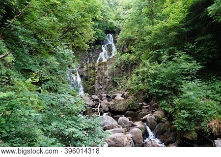 Torc Waterfall Is A Waterfall At The Foot Of Torc Mountain, 8.0 Km From Killarney In County Kerry, I