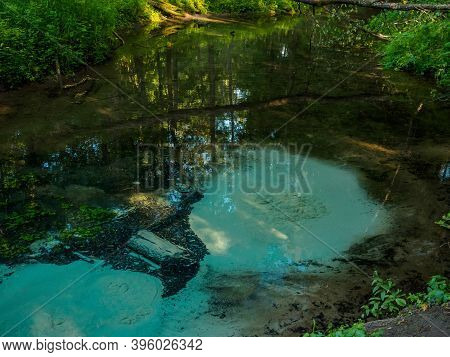The Most Famous Source Of Natural Mineral Water, Bubbling Wellspring. Green Welspring In Mari El, Ru